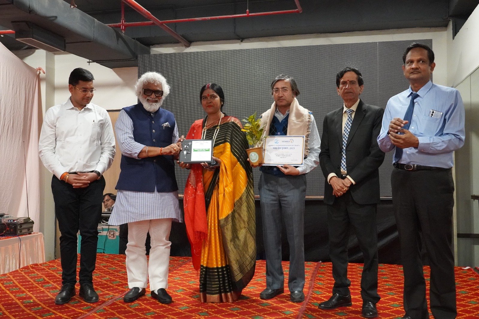 “Award Ceremony Celebrating Dedication & Impact”